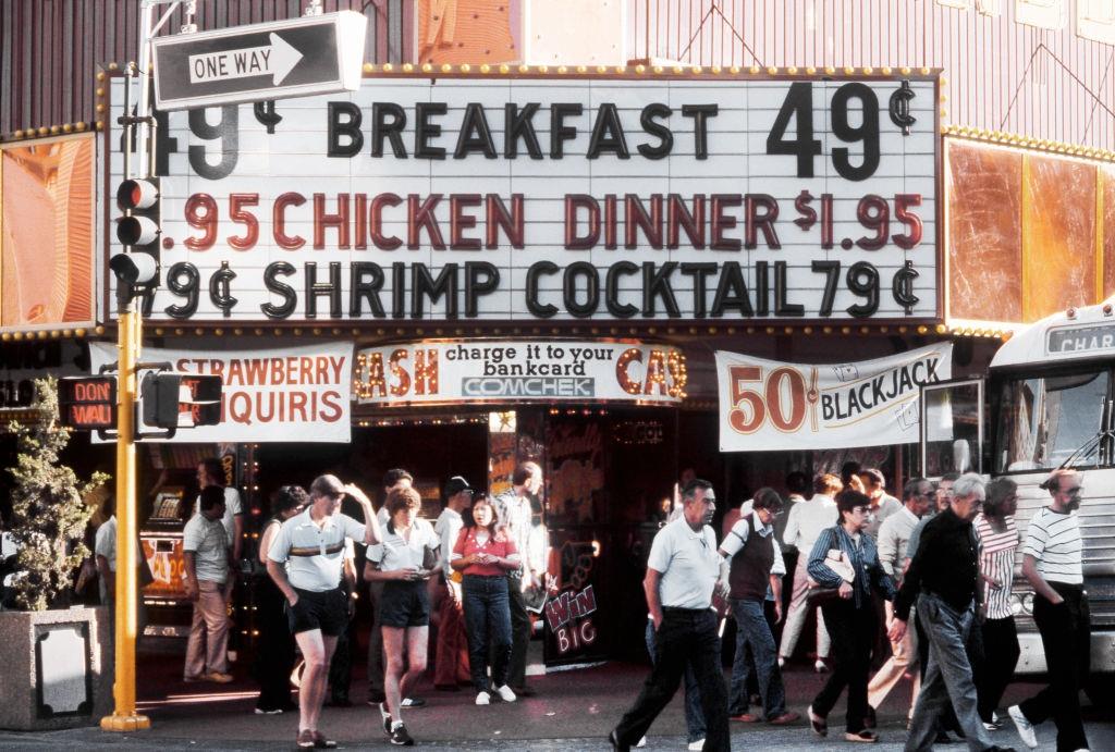 #12 A view of a street level casino offering a cheap breakfast, dinner and shrimp cocktail on the Las Vegas Strip, 1983.