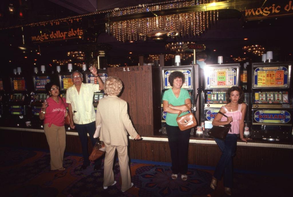 #25 Players in the slot machine room of a Las Vegas casino in 1980.