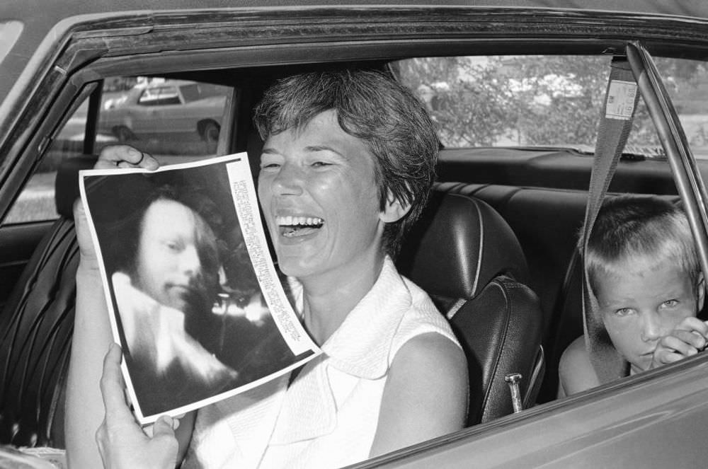 #10 Janet Armstrong reacts to a picture of her husband that was taken during a telecast from the spacecraft and beamed back to Earth on July 18, 1969.