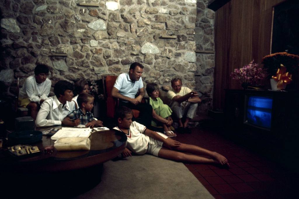#16 Jan Armstrong watches her husband’s historic mission on television in El Lago, Texas, surrounded by her friends and neighbours, July 1969.