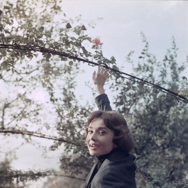 #26 Audrey Hepburn on location for ‘Love in the Afternoon’ near the Chateau de Vitry in Gambais, France, 1957.