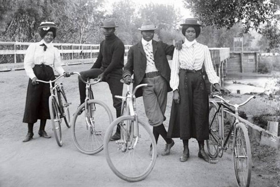 #1 Four cyclists stop for a photograph on the Alameda Avenue Bridge, Denver, 1905.