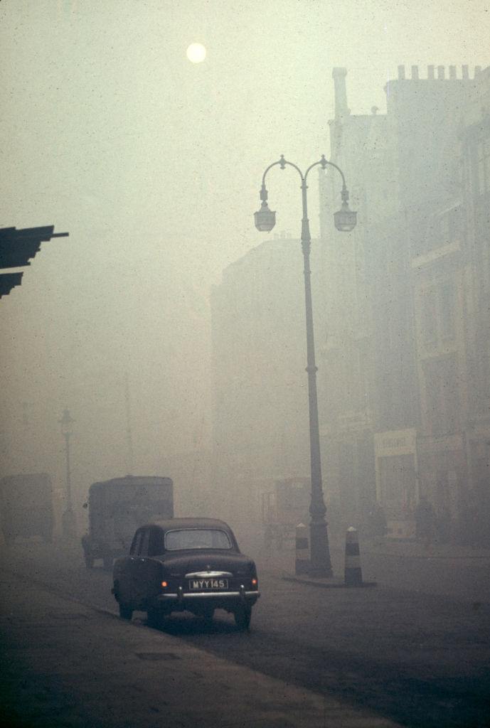 #13 View along a foggy street, London, 1952.