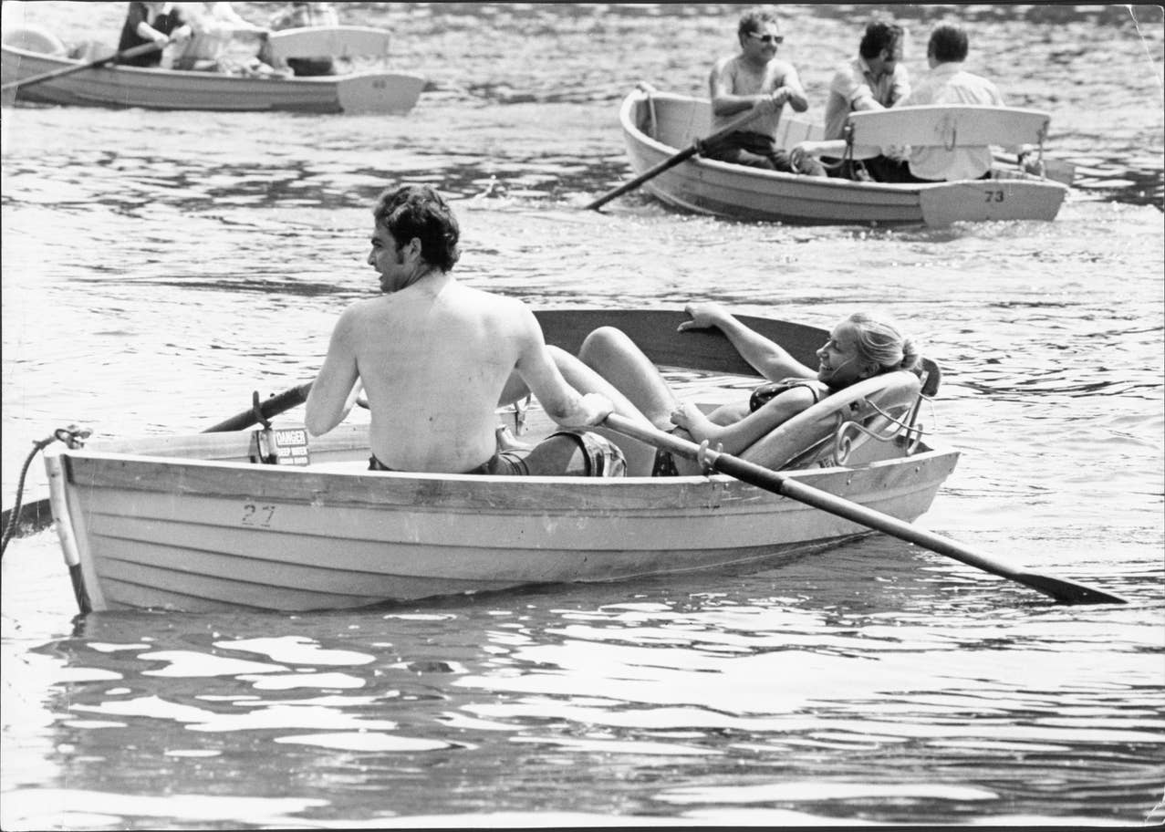 #12 A couple enjoy a boat ride