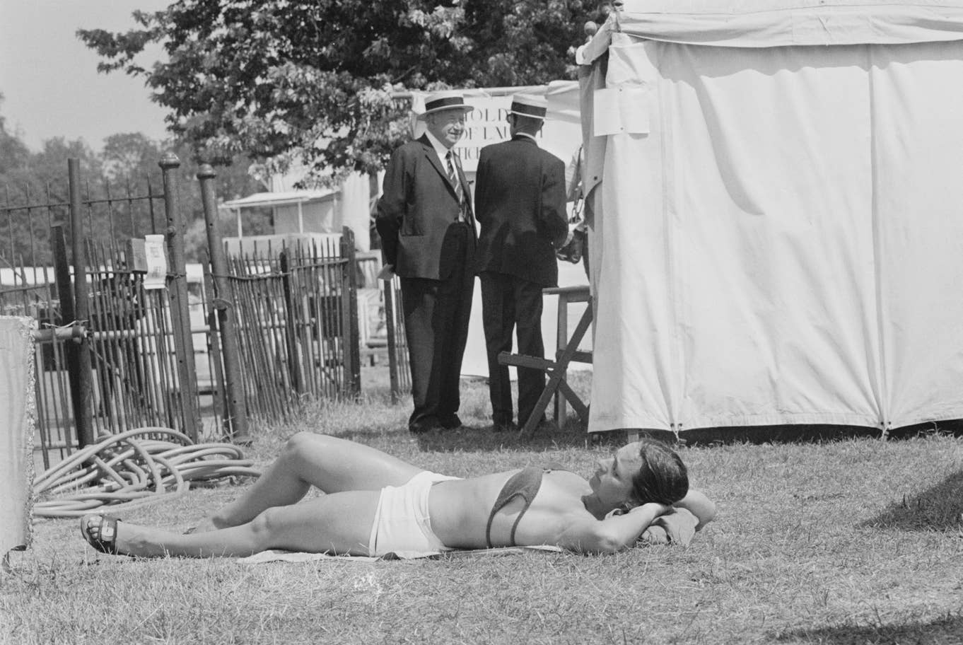 #16 A woman sunbathing at Henley Royal Regatta, Henley-on-Thames, Oxfordshire