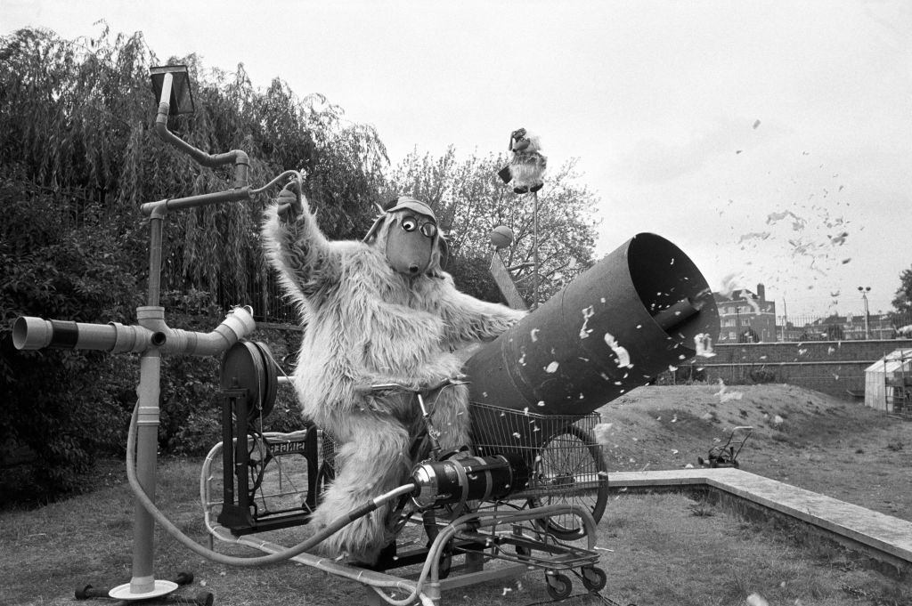 #19 Wellington Womble, hit-maker from Wimbledon Common, sits aboard his rainmaker machine. Summer Heatwave 1976.