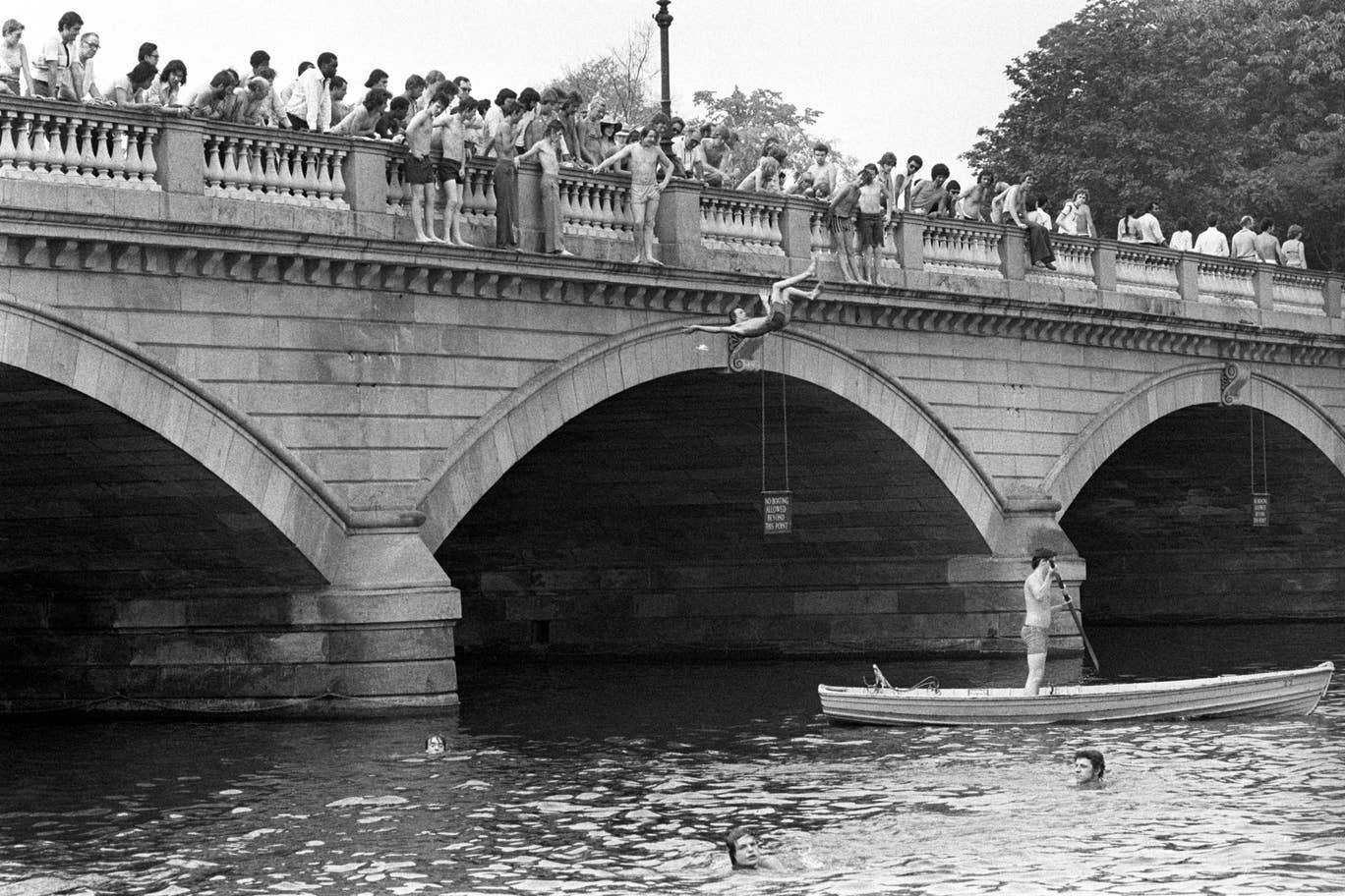#2 Some enterprising bathers use the bridge at the Serpentine as a diving platform in a bid to keep cool
