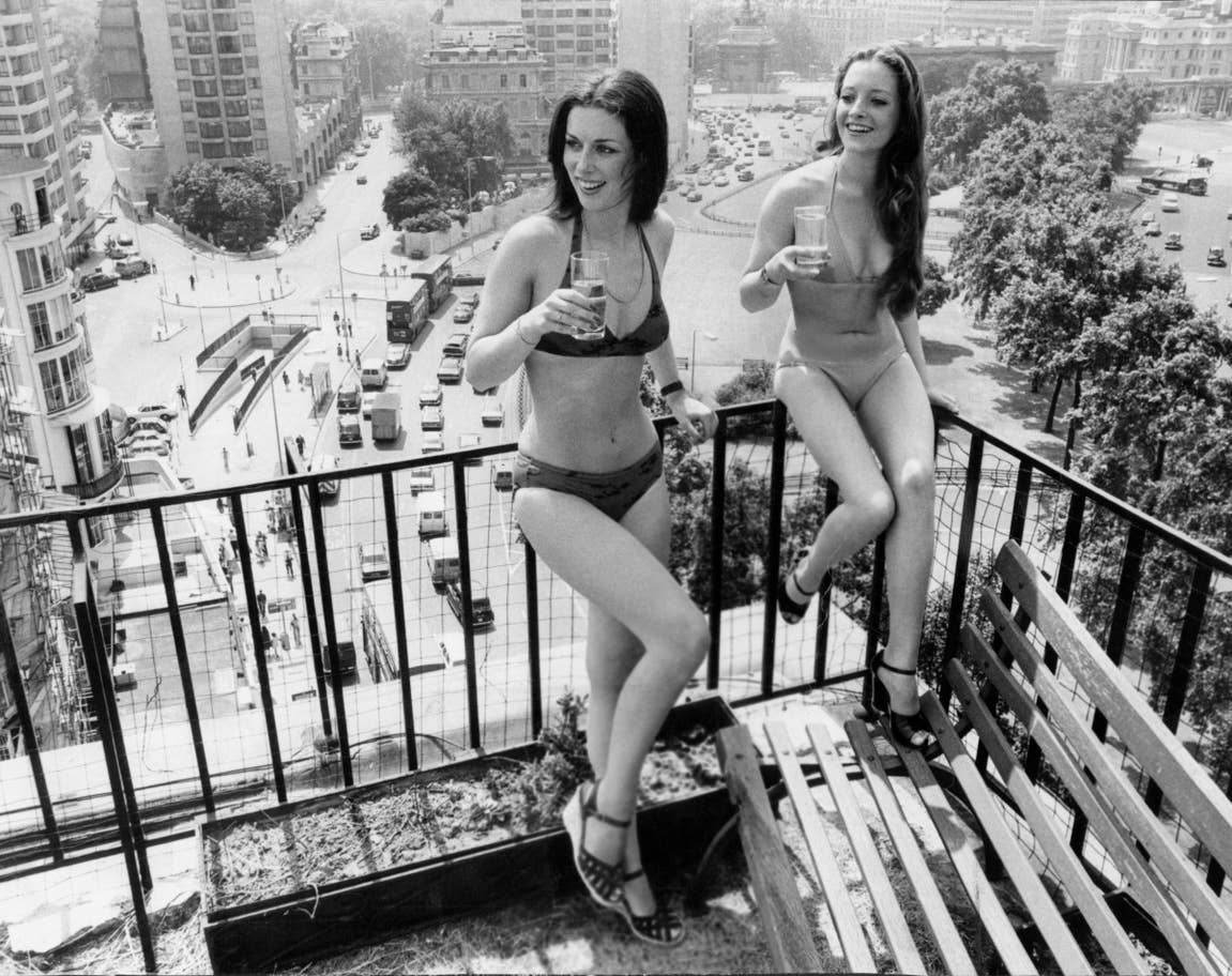 #7 Two women enjoy the rooftops views and heatwave