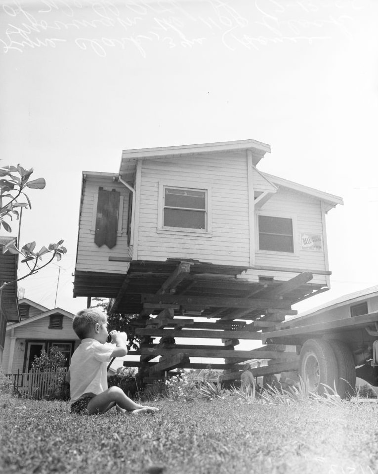 #7 House moving in 1100 block of West 96th Street, Los Angeles, 13 July 1955.