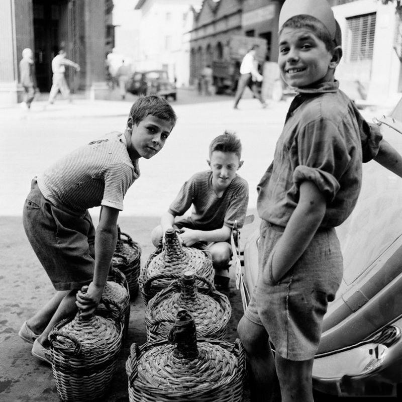 #37 Boys waiting in queue for petrol, 1957