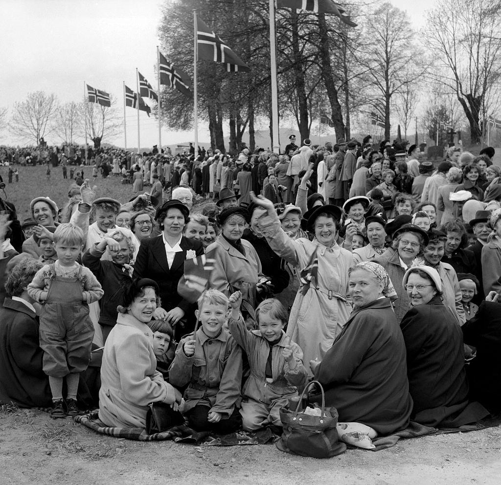 #12 Crowds gather outside the cathedral for the wedding of Norwayan Princess Ragnhild, 1953.