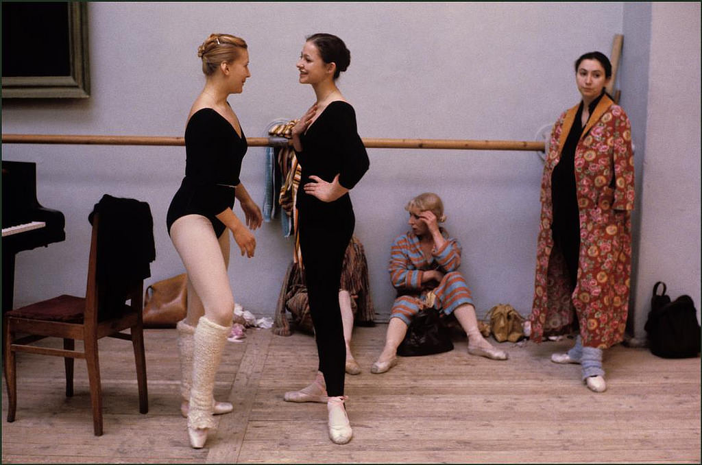 #1 Ballerinas take a break to chat and relax during a break in rehearsals.