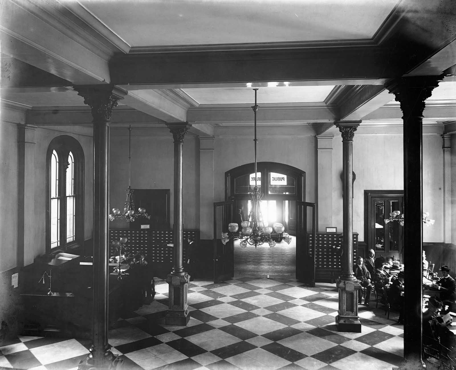 #18 A glimpse of the Main Hall can be seen through vestibule.