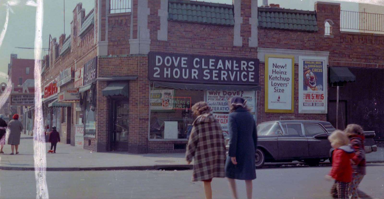 #28 94th Street and 37th Avenue with a view of the Polk Theater, Jackson Heights, Queens, 1964.