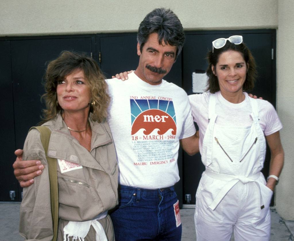 #7 Sam Elliott and Katharine Ross with Ali MacGraw during 2nd Annual Benefit Concert, 1984.