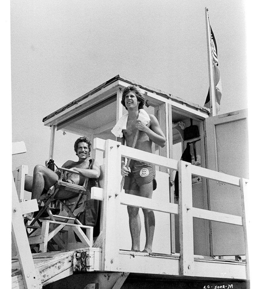 #17 Sam Elliott and Parker Stevenson on lifeguard tower in a scene from the film ‘Lifeguard’, 1976.