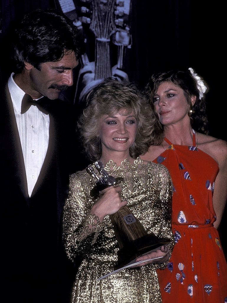 #23 Sam Elliot with singer Barbara Mandrell and actress Katharine, 1981.