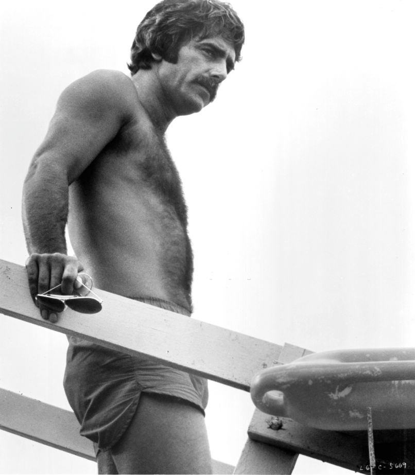 #7 Sam Elliott on lifeguard tower in a scene from the film ‘Lifeguard’, 1976.
