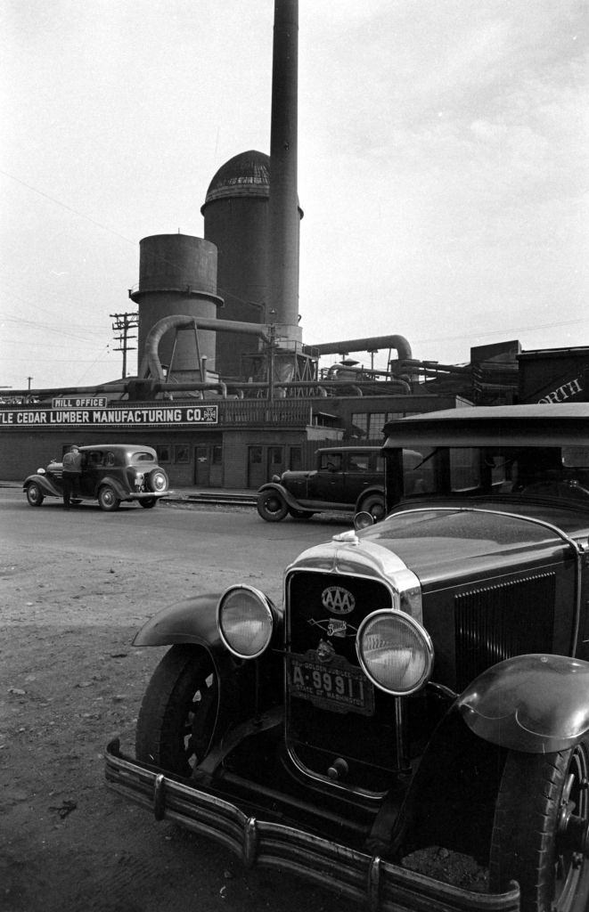 #40 Vehicles parking in front of the Seattle Cedar Lumber Manufacturing Company, Salmon Bay, Seattle,1939