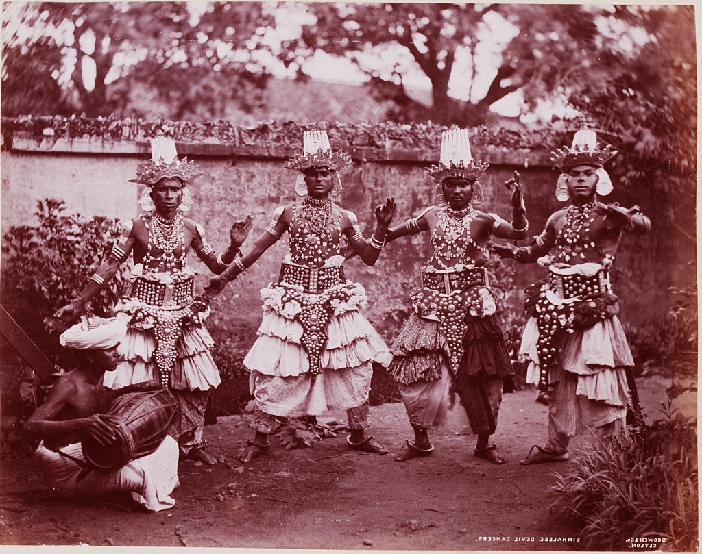 #41 Four male Singhalese dancers in traditional costum, Sri Lanka, 1880s.