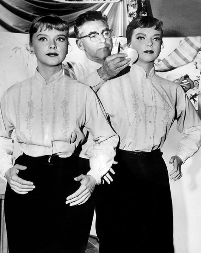 Will the real Anne Francis please stand up? Makeup artist Charles Schram applies some powder on the set of “The After Hours” — to the face of a dummy.