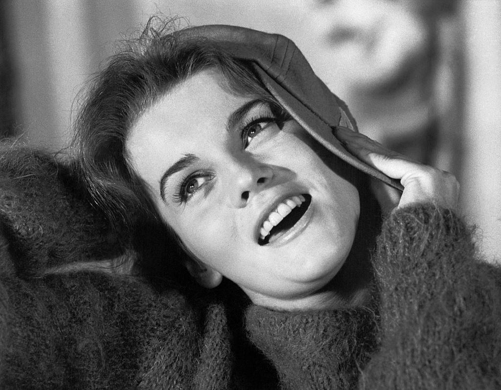 #35 Ann-Margret holding Cap to her head, 1962.