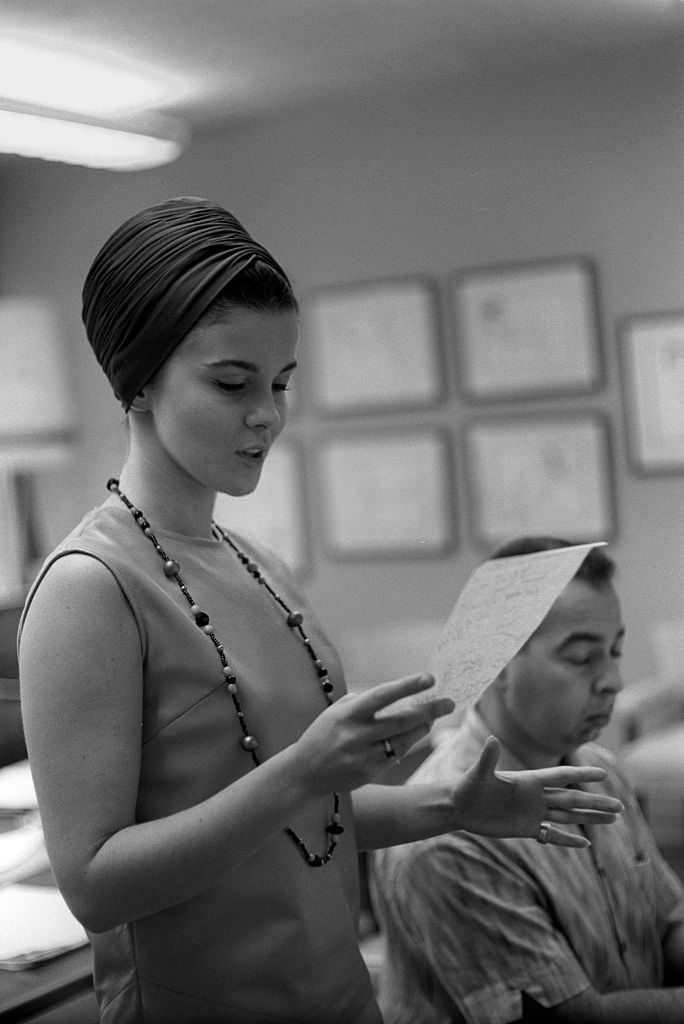 #39 Ann-Margret rehearsing in studio with composer Hank Levine.
