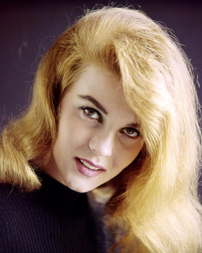 #23 Ann-Margret in a purple knitted jumper, 1965