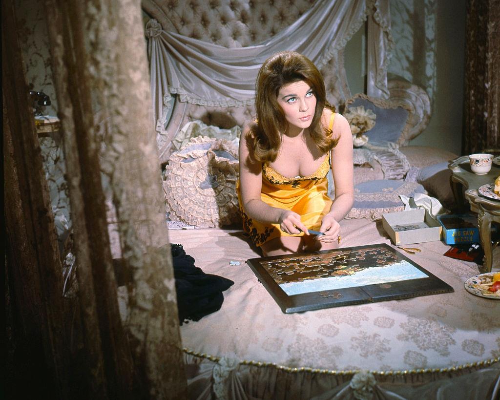 #43 Ann-Margret completes a jigsaw puzzle in ‘The Cincinnati Kid’, 1965.