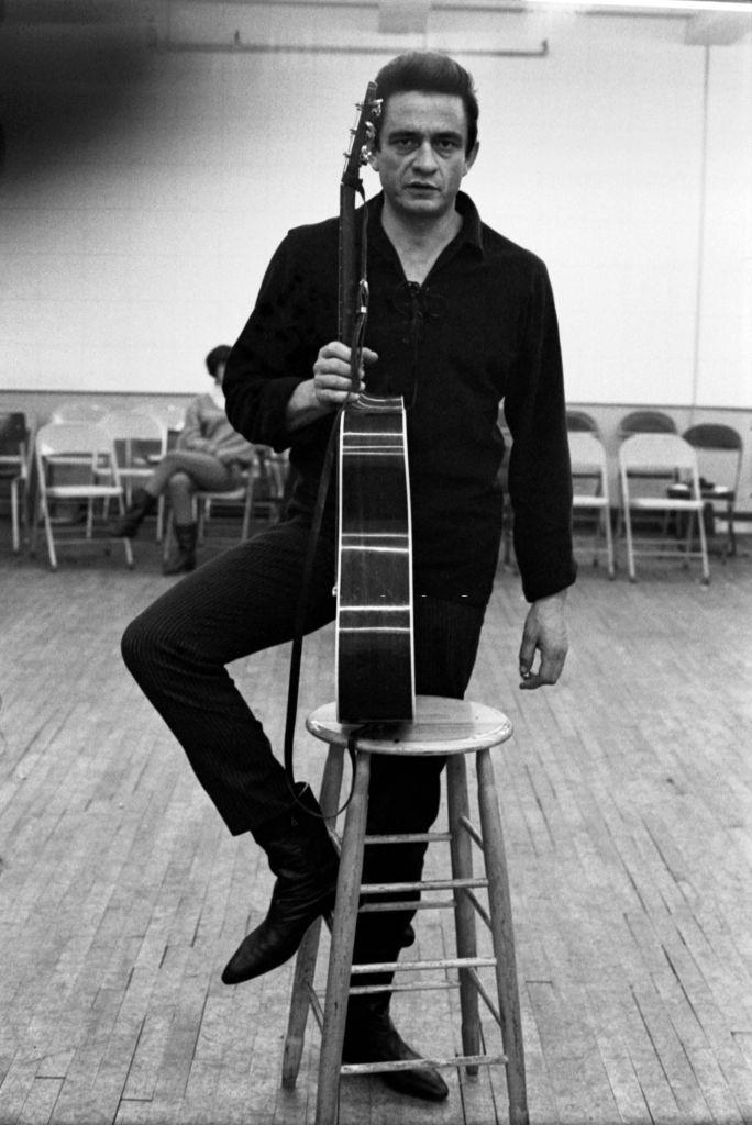 Johnny Cash poses for a portrait on the set of ‘The Jimmy Dean Show’, 1964.
