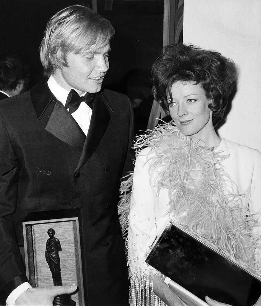#36 Maggie Smith with actor Jon Voight at the London Palladium, 1970.