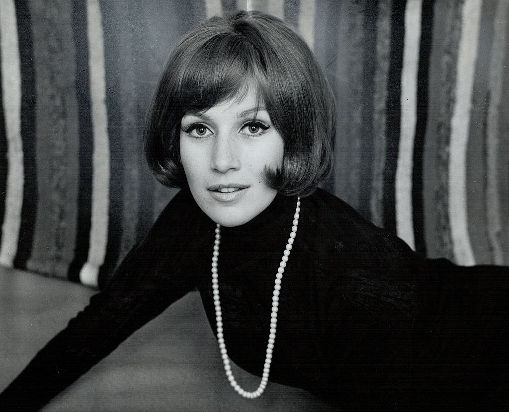 #47 Maggie Smith wearing black dress in Toronto, 1964.