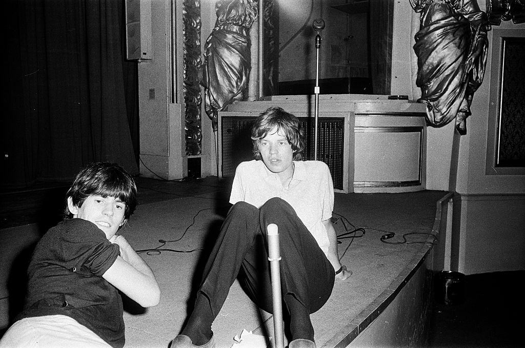 Mick Jagger on stage during rehearsals for a BBC radio broadcast at the Playhouse Theatre, London, circa 1964.