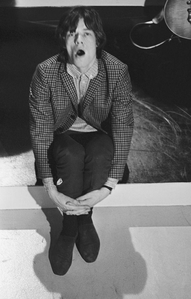 Mick Jagger looks bored during rehearsals for ABC’s ‘Thank Your Lucky Stars’ TV pop music show, 1964.