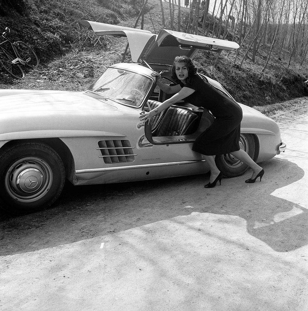 #25 Sophia Loren pushing her Mercedes at third Cinema Rally, 1951.