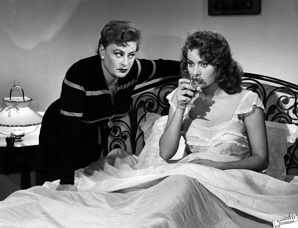 #34 Sophia Loren and Alda Mangini in a scene from the movie ‘Pilgrims of love’. Livorno, 1953.