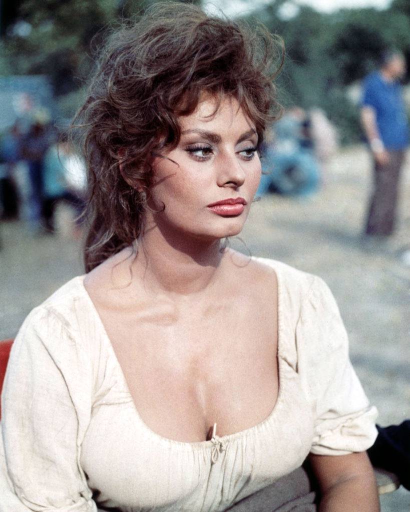#49 Sophia Loren in peasant costume on a film set, circa 1955.