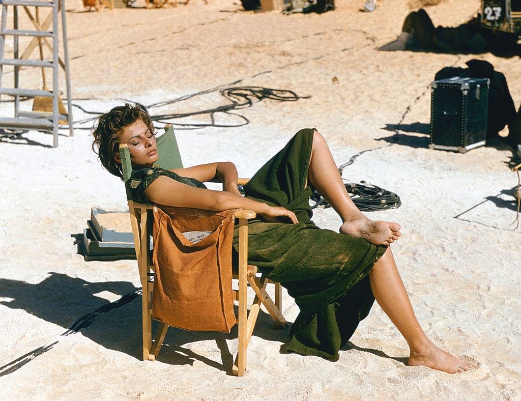 #4 Sophia Loren relaxes on the Libyan set of the desert adventure film ‘Legend of the Lost’, 1957.