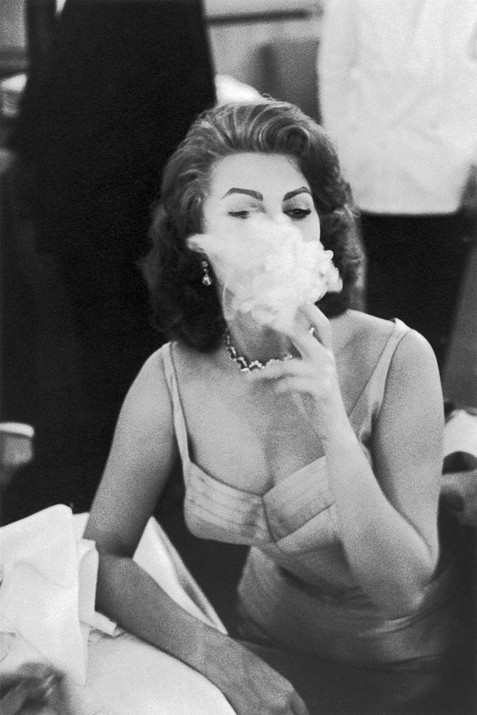 #12 Sophia Loren smoking in a studio, 1950s.