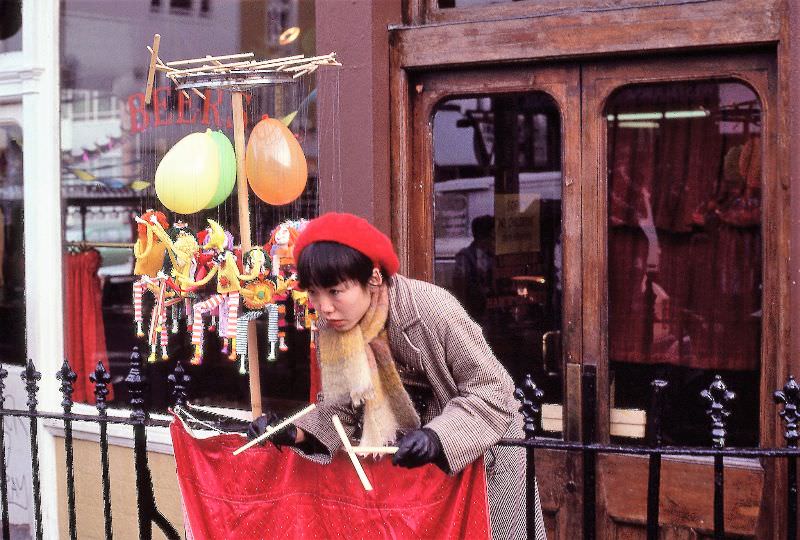 #21 A puppeteer outside the Earl of Lonsdale Pub, Portobello Road, London, 1980
