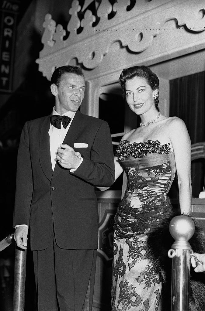 #15 Frank Sinatra escorts Ava Gardner to MGM’s Technicolor “Show Boat” premiere.