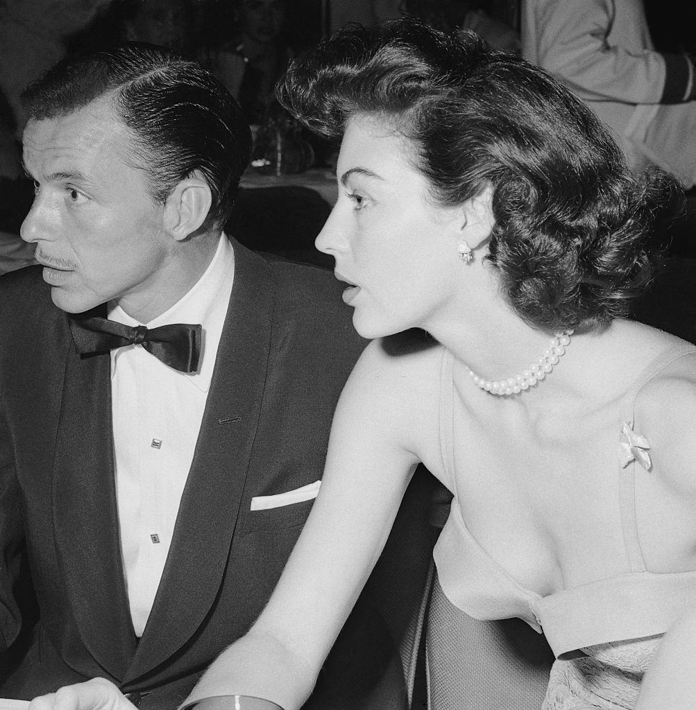 #17 Frank Sinatra and Ave Gardner Sitting at Table, 1951.