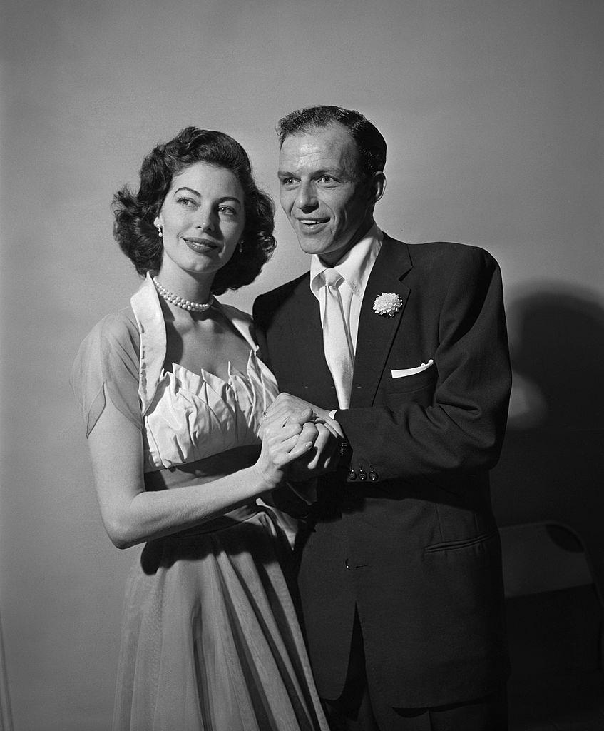 #21 Frank Sinatra and Ava Gardner on their wedding day. Image dated November 7, 1951.