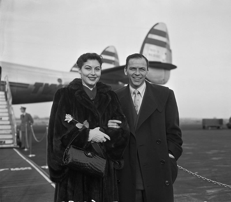 #25 Frank Sinatra and Ava Gardner at LaGuardia Airport, New York, 1951.