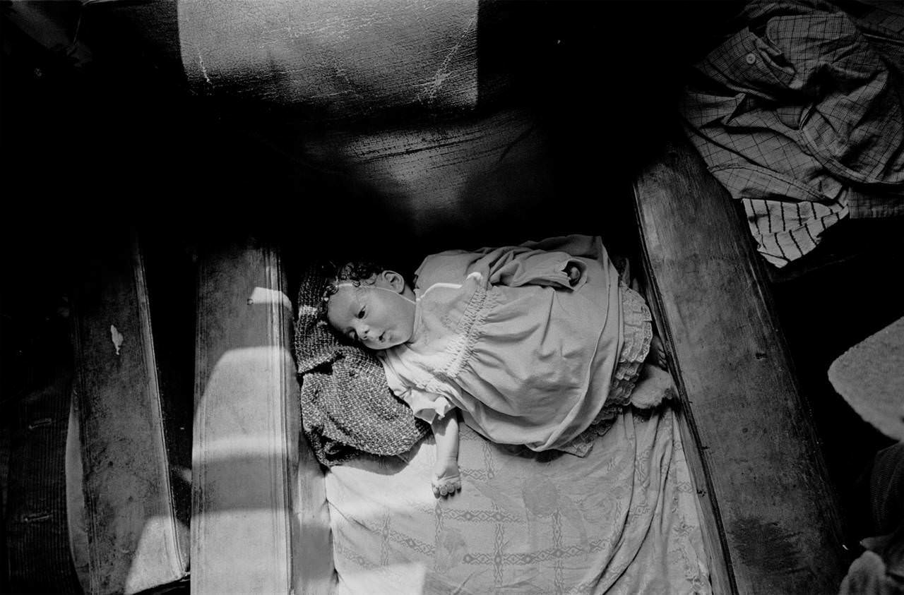 #2 Baby asleep in armchair slum property Balsall Heath