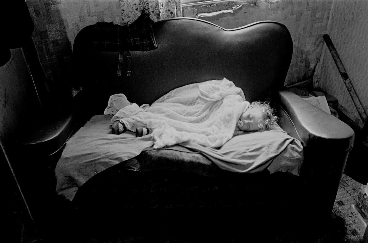 #4 Baby asleep in slum property Balsall Heath 1970