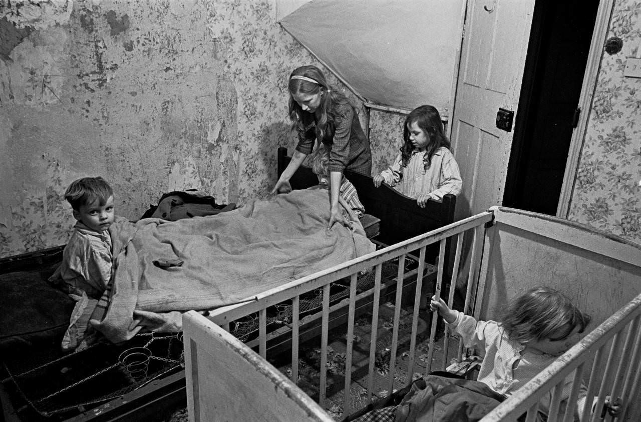 #1 Mrs Milne puts her children to bed in the winter, Balsall Heath 1968