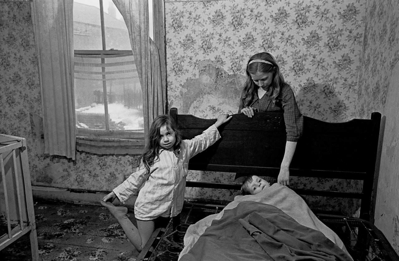 #9 Mrs Milne puts her children to bed in the winter, Balsall Heath 1968