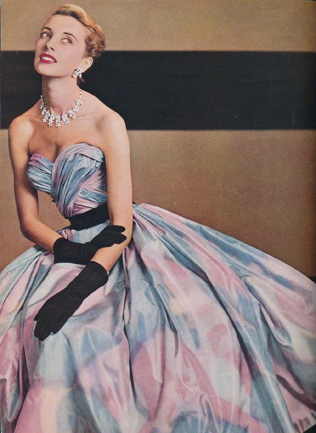 #20 Model is wearing a beautiful taffeta strapless evening gown by Pierre Balmain