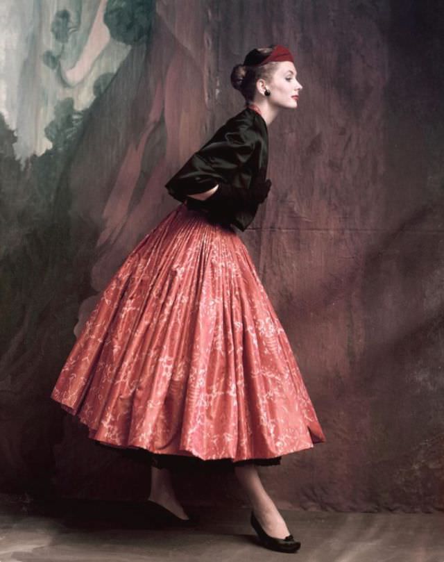 #23 Suzy Parker is wearing Givenchy’s Chinese printed taffeta skirt with a lace petticoat and a quilted satin blouse